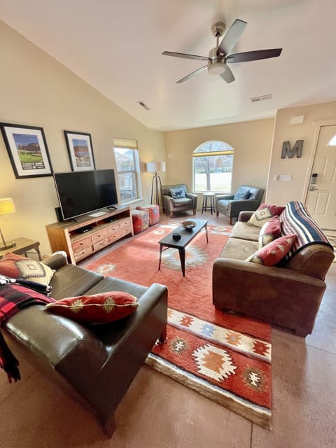 Enjoy spacious living room with many seating and queen size sleeper sofa.  
