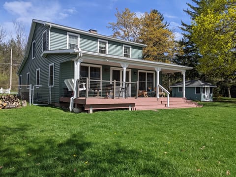 New front porch seating area added in 2021. With porch swing. Great lake views.