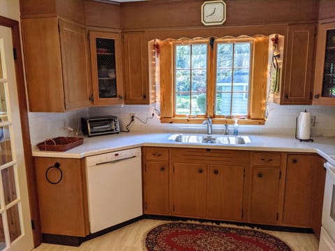 Kitchen with new countertop, sink and dishwasher
