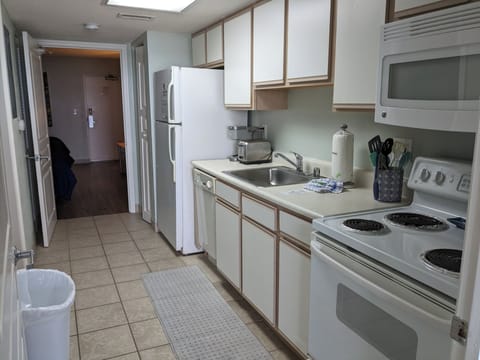 Condo entrance is through the bedroom