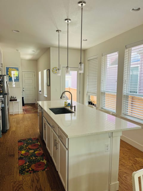 Kitchen is well-appointed with coffee pot, microwave, toaster, airfryer/blender