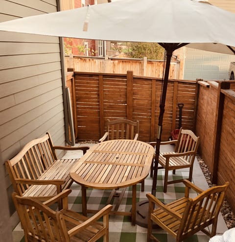 Relax in the teak chairs and enjoy some grilling time out on the porch!