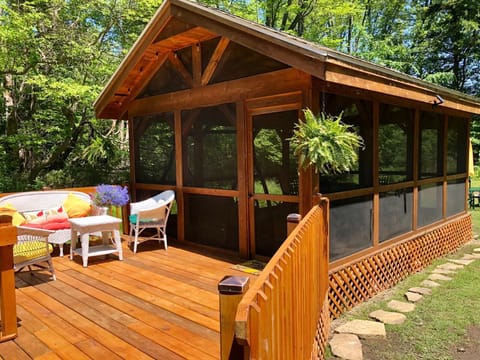 Large deck and screened porch.