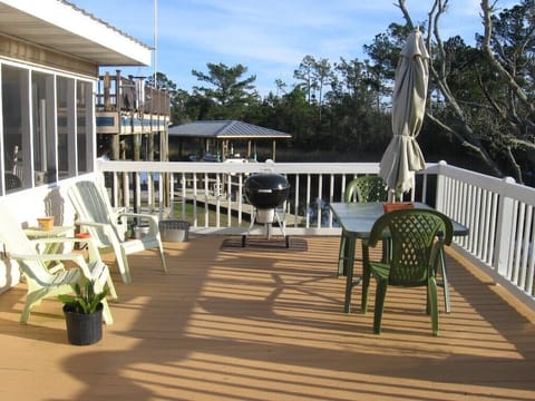 Left side of large outside porch/deck