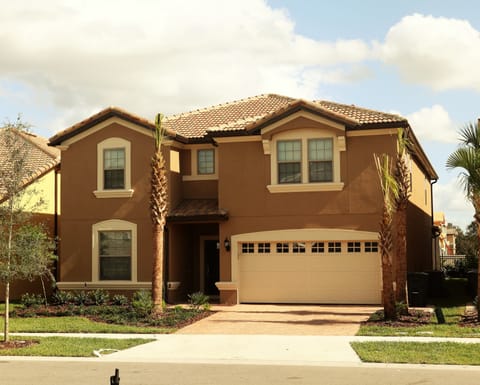 This luxury tile roof, brick paving villa
