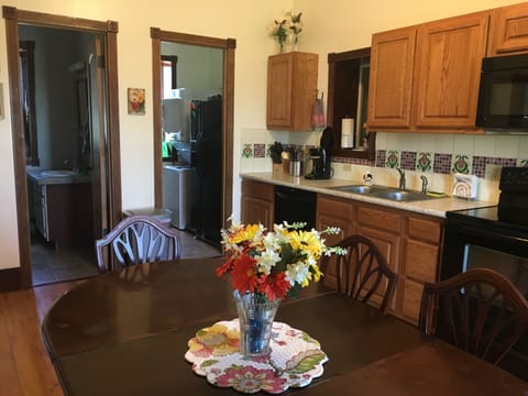 Fully stocked kitchen, pantry & dining table to enjoy a delicious meal