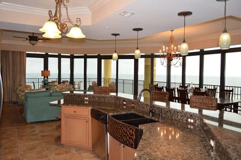 Enjoy commanding views while preparing meals. Custom copper sink