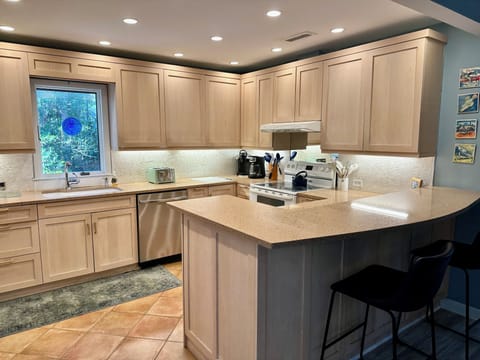 Fully stocked kitchen. This kitchen is larger than most Sparrow Ponds Cottages.