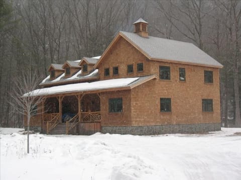 The snow shoe/ X country trail starts to the right of the house  - river behind
