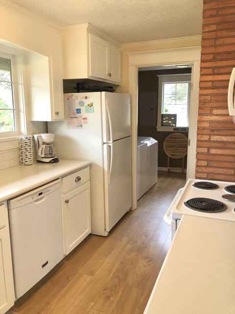 Kitchen with view of laundry/mud room
