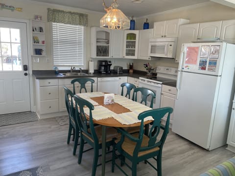 Stocked open floor plan kitchen.