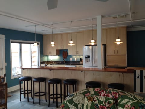 Open concept custom kitchen with barstools