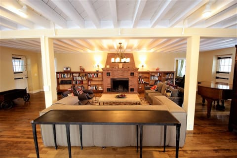 Unwind with friends and family in front of a crackling fire.