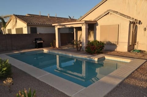 One story neighbors ensure privacy in the backyard oasis