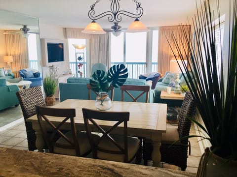 View of living area/dining/balcony from kitchen