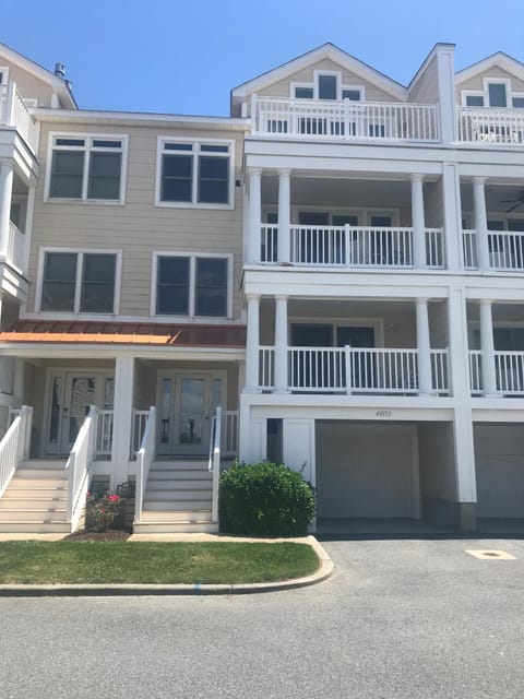 Exterior view - Private balconies on every level and two car garage with storage