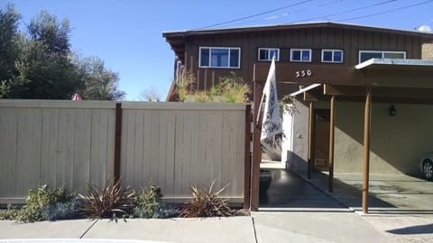 View from the street. The ocean is seen from the back side of the casa.