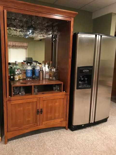 Lower level extra refrigerator and dry bar