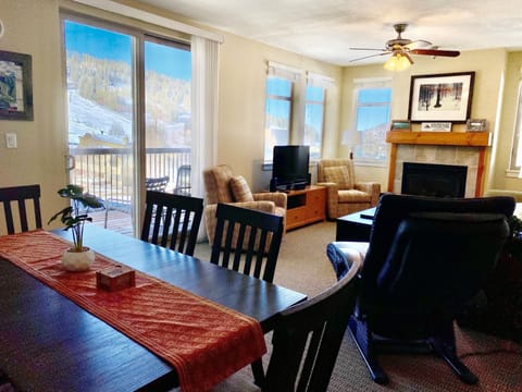 Dining room with slope views like no other units. New dining table set. 