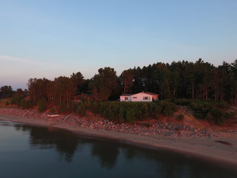 Cottage at Sunset from Lake Superior 