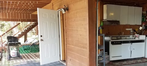 downstairs mini kitchen near grill for dining on either level