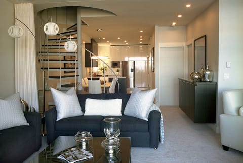 comfortable Living area with unique stairway to second bedroom area