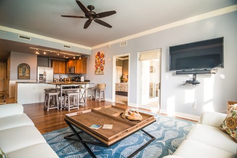 Beautiful living area includes unique local artwork and designer furniture