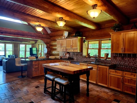 Gourmet kitchen with island and ample prep area