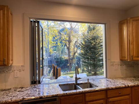New Window added bringing nature indoors overlooking deck & Eagle River!

