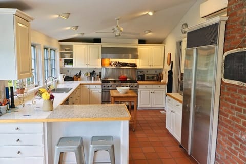 Gourmet kitchen with Wolf stove and Sub-zero refrigerator