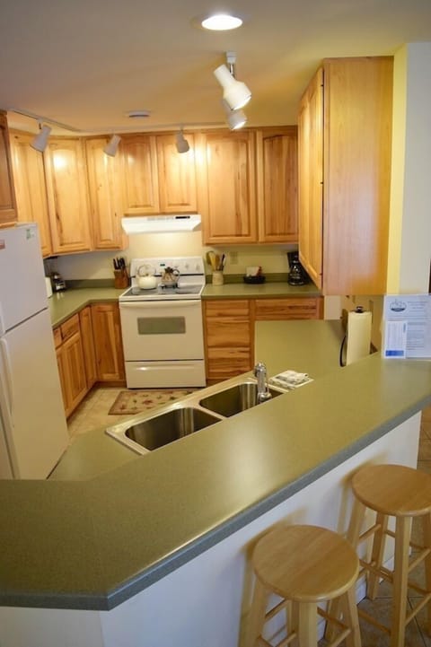 2 additional stools at counter besides 6 chairs at table. 