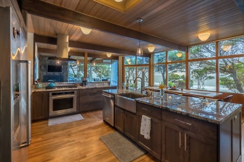 Open kitchen looking toward dining & great rooms