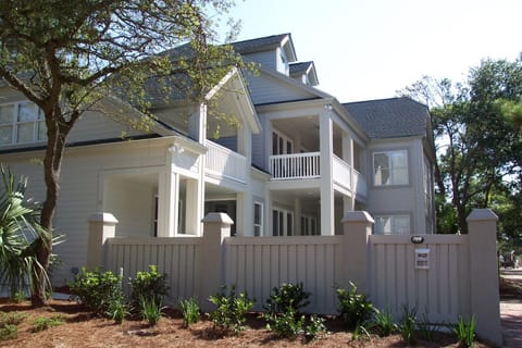 A fence surrounds the pool and offers privacy on the deck and patio.