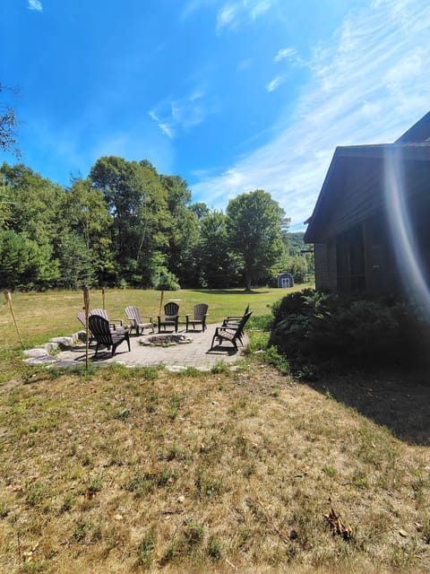 backyard, D&H traills, fire pit, outdoor grills, horseshoe, and wood provided