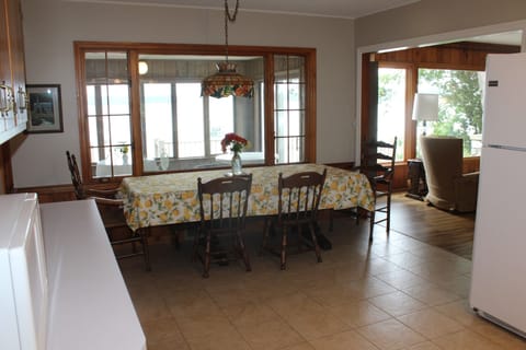 kitchen, dining area looking through to the 3 season porch