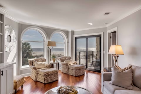 Inviting Living Area with comfortable seating and large windows - ocean views