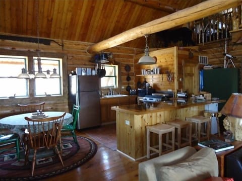 Kitchen dining area, gas range and microwave. Laundry room with washer and dryer
