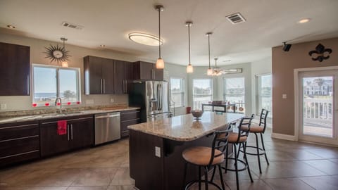 View of Kitchen Island , Breakfast Area and Back Porch