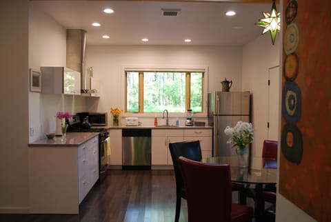 Large, bright and fully equipped kitchen.