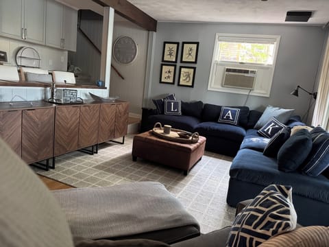 Bar cabinets and large sectional makes for a great movie night or game-day watch