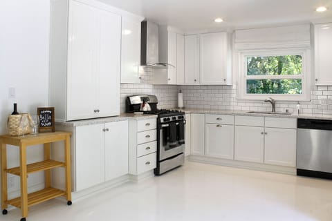 Sunny kitchen with all the kitchen amenities.
