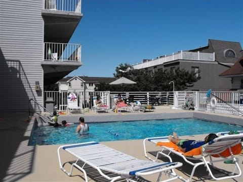 Ocean side view of Balconies, Pool deck & Garage