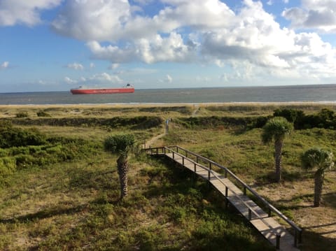 Balcony view! Beach front! Watch the ships come in and out every day!