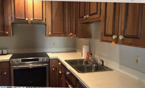 Kitchen in mother-in-law suite. Also has dish washer and refrigerator.