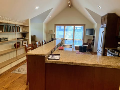 Kitchen and chairs and TV