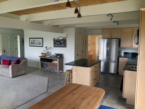 Old kitchen table in foreground--updated to nice live-edge wood table.