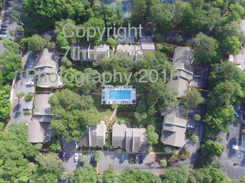 Bird's eye view of Coligny villas and the properties pool