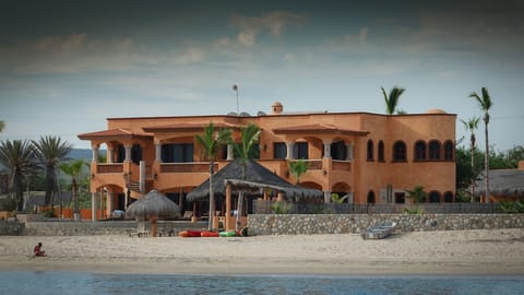 Fully staffed ultimate luxury villa on golden soft sand and warm sea.
