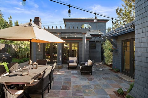 Great outdoor living space. Guesthouse straight ahead and studio on the right.