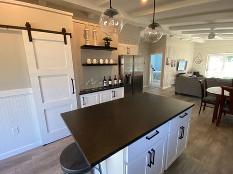 Island with bar stools for extra dining space